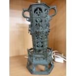 Unusual cast metal twin handled oriental ornament converted to a lamp.