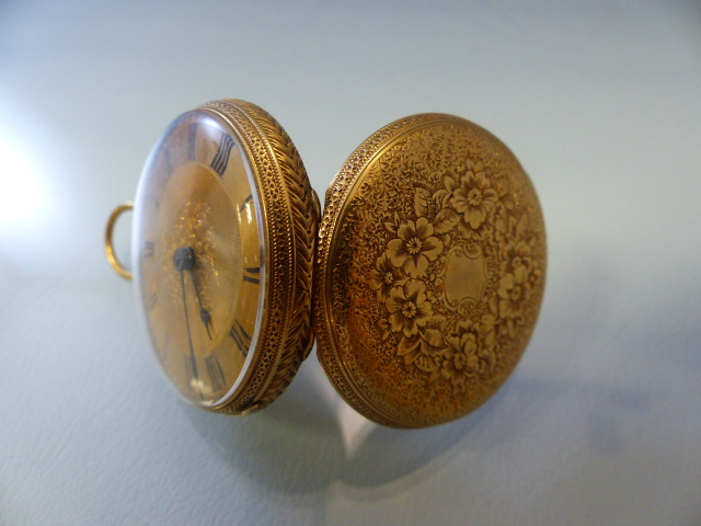 18ct Gold cased pocket watch. Winds and ticks. Roman Numeral Chapter ring. Back Decorated with - Image 4 of 4