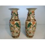 Pair of Japanese Guanyao style vases with everted rims. Enamel overlay painted scenes of battle.