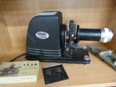 Magic Lantern slides with projector and film splicer. Lot Compromising of over 100 slides