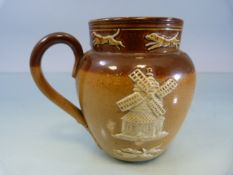 Miniature Royal Doulton brown jug with applied cream decoration depicting dogs, men and windmills.