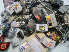Games consoles - Super Nintendo with remotes and a Nintendo 64 with remotes and various games to
