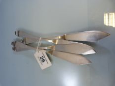 Four Silver Continental fish knives marked to reverse B.C. and 90. Total weight approx 201g.