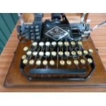 An oak cased 8 Blick Vintage Typewriter 'Cheapside London'