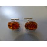 Pair of silver and amber cufflinks