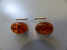 Pair of silver and amber cufflinks