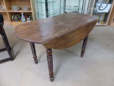 Antique Mahogany drop leaf table on thick barley twist legs