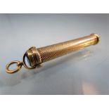 Propelling Pen/Pencil by S. Mordan & Co with engine turned decoration. Unmarked gold.