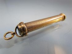 Propelling Pen/Pencil by S. Mordan & Co with engine turned decoration. Unmarked gold.