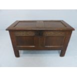 Joined oak 18th Century coffer with fielded panels and rectangular hinged lid.