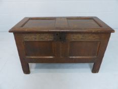 Joined oak 18th Century coffer with fielded panels and rectangular hinged lid.
