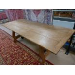 Large handmade dining room table with cast iron supports under