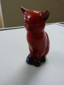 Royal Doulton Flambe figure of a seated cat (small chip to ear)
