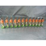 Set of twelve Britains military lead figures, all with movable arms, complete with rifles.