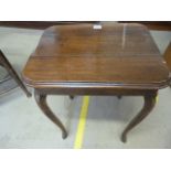 Edwardian Oak side table with sabre legs.