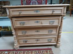 Ornate chest of pine drawers. Turned pillar supports to sides. Top drawer with fitted compartments