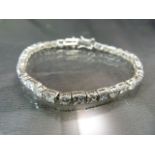 Silver (925) Tennis Bracelet approx 7" long and set with alternate round and square CZ stones approx
