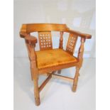 Robert 'Mousman' Thompson oak Monk's Chair. Curved back rail and shaped arms supported by three