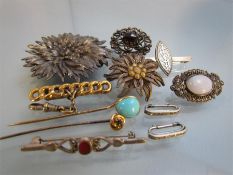 Small Collection of Mostly silver brooches. Including a small bar brooch with the monogram ISG