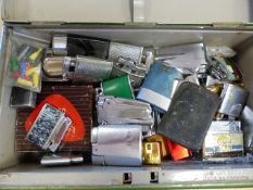 Large collection of approx 40 lighter to include Ronson, others and a Corona Gun lighter