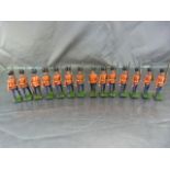 Set of fourteen Britains military lead figures , hand painted all with movable arms and weapons