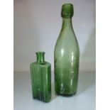 Two 19th Century green glass bottles. One Beer Bottle from Hann & Co Brewery, Honiton. The other