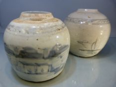 Two Early blue and White stoneware glazed ginger vases (no covers). Decorated with coastal scenes.