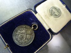 NAAFI hallmarked silver medal 'Command Small Arms Meeting, Egypt 1928' in original box. Approx