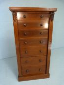 Victorian Mahogany Wellington chest of seven drawers, carved brackets and locking side plate on