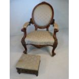 Edwardian mahogany open arm chair with matching galleried footstool