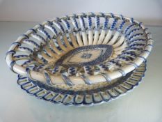 An English Creamware Chestnut Basket and plate. C.1780 in Blue and White with each lattice arm