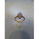 18CT yellow gold ring of lozenge form set with 55 points of diamonds