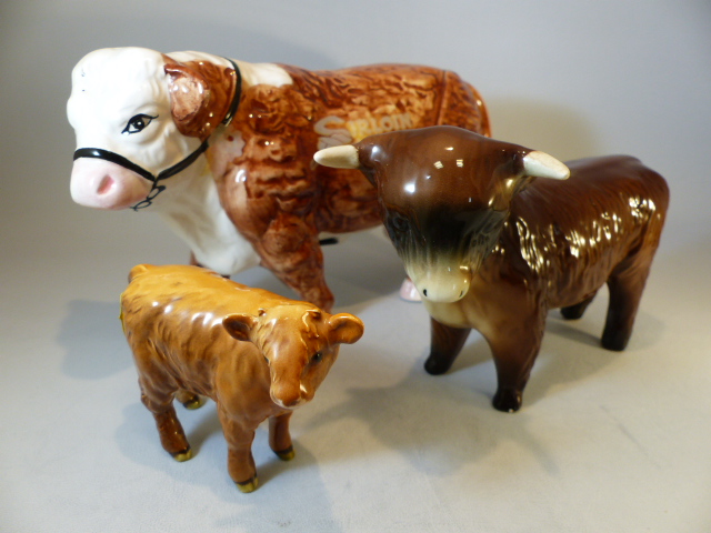 China highland cattle - Beswick highland calf, unmarked highland cow and a Hereford Red money bank