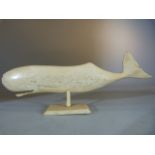 Finely Carved 19th Century sailor work marine ivory model of a Sperm whale mounted on section of