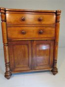 George III mahogany commode with original ceramic bowl and lid, modelled as a chest and cupboard