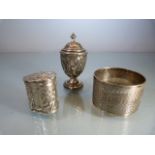 Three hallmarked silver items to include a napkin ring, pill box and pepper pot (1894) total