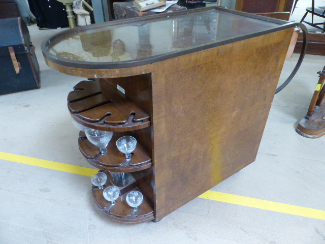 BETJEMAN - A Mid Century drinks trolley/cabinet with birds eye maple veneer. Metal loop handles with