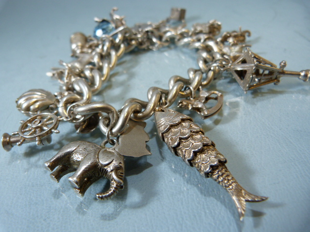 Two hallmarked silver chains with approx 35 silver coloured charms along with a silver box chain and - Image 3 of 6