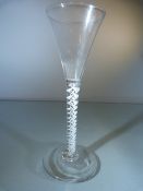 Georgian wine Glass c1770 with double twist opaque stem and splayed foot. Rough Pontil to base