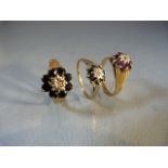 Three ladies 9ct gold rings in the Daisy Cluster style