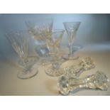 Three Regency cut glass wine glasses along with a large cut glass runner and two moulded knife