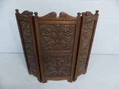 Oak Three Fold fire screen - Central panel carved with an Cornucopia supporting fruit and floral