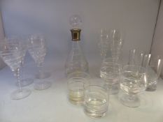 Modern suite of Crystal Glassware with spiral moulded decoration. Compromising Silver topped