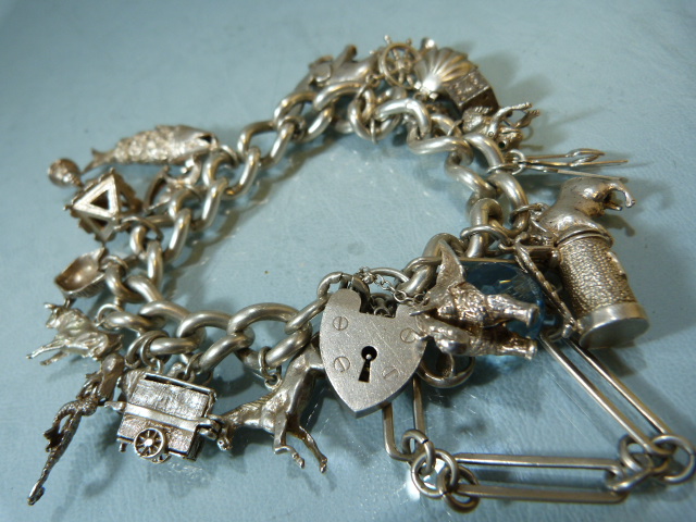Two hallmarked silver chains with approx 35 silver coloured charms along with a silver box chain and - Image 2 of 6