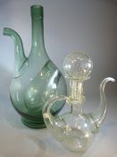 Green glass wine decanter with ice recess along with a clear 'bubble' glass oil pourer with stopper