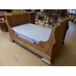 Lightwood single sleigh bed and mattress