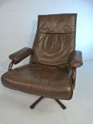 Danish leather reclining swivel chair marked KEBE
