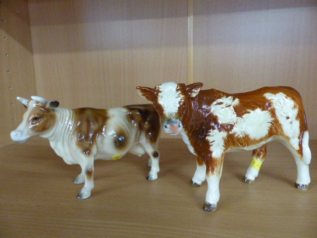 Goebel figure of a bull and one other unmarked cow.