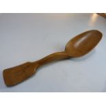 Treen boxwood Cawl spoon of simple form dated 1877. Writing verso. Approx 17.5cm