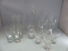 Suite of Modern glassware with heavy weighted bottoms. Compromising decanter, two large wine